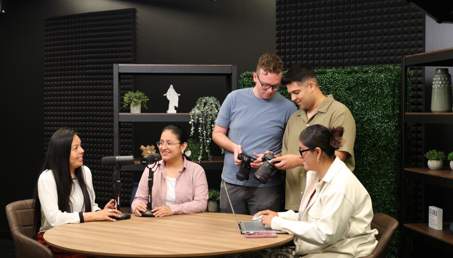 Students collaborating using Studio E to complete digital content projects