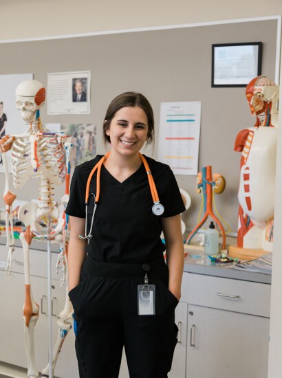 Smiling medical assistant with stethoscope
