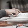 Hand on a textbook