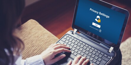 female accessing computer privacy settings
