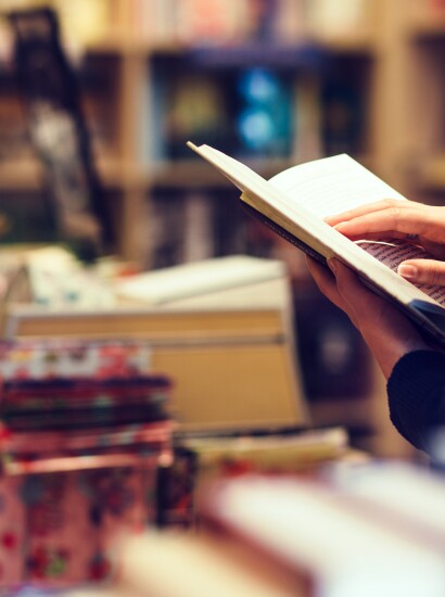 Reading a book in the bookstore