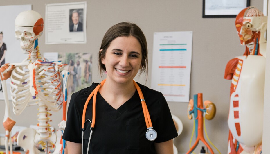 Smiling medical assistant with stethoscope
