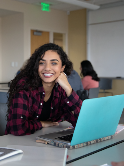 female student smiling in class