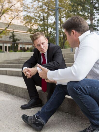 Students talking on steps