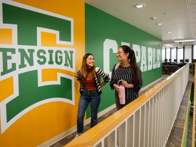female students inside ensign hallway