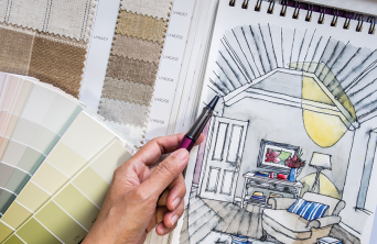 Interior Design student looking at paper