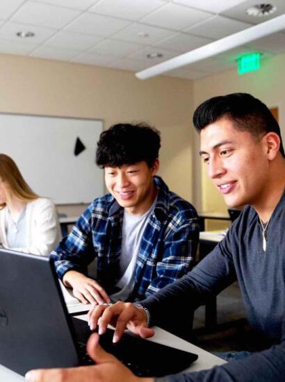two male students studying together