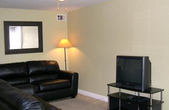 Living room with couches and TV