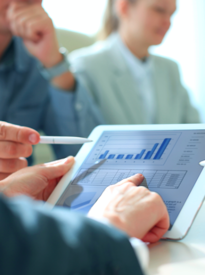 pointing to analytics on a tablet