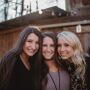 Three female students smiling
