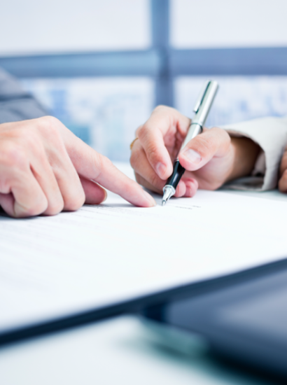 advisor helping student with a form