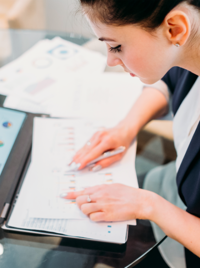 woman analyzing and comparing data