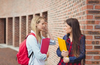 Female students talking outside