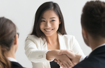 girl shaking hands in job interview